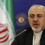 Iran's Foreign Minister Zarif speaks during a joint news conference with his Turkish counterpart Davutoglu in Istanbul