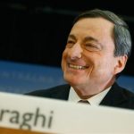 European Central Bank President Mario Draghi smiles during the monthly ECB news conference in Frankfurt