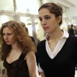 Members of Pussy Riot Tolokonnikova and Alyokhina arrive to meet the media in Singapore