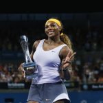 Williams of U.S. holds up Brisbane International trophy after defeating Azarenka of Belarus in women's singles final in Brisbane
