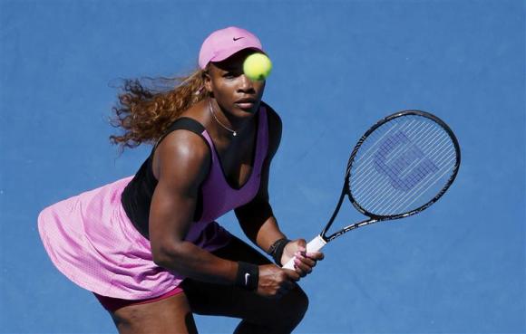 Serena Williams of the U.S. eyes the ball during her women's singles match against Daniela Hantuchova of Slovakia at the Australian Open 2014 tennis tournament in Melbourne