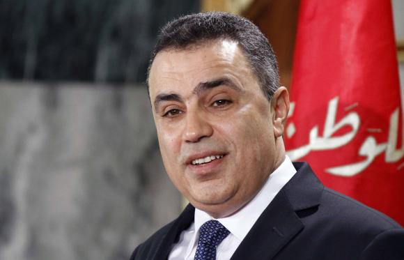 Tunisia's PM Jomaa speaks during a news conference in Tunis