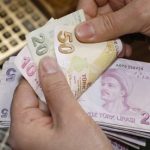 Turkish lira bills at a currency exchange office in Istanbul