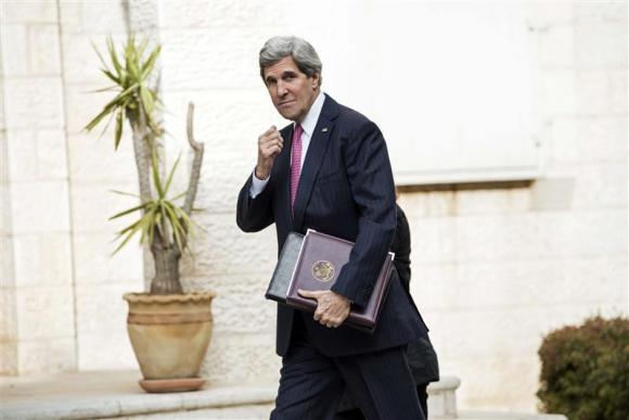 U.S. Secretary of State John Kerry arrives for a meeting at the presidential compound in the West Bank city of Ramallah