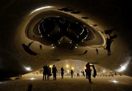 snow-covered Cloud Gate at Millennium Park in downtown Chicago