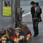 Sidewalk memorial for woman beaten outside Santa Ana club