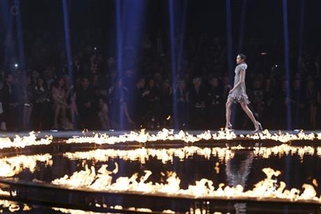 A model wears a creation for Roberto Cavalli women's Fall-Winter 2014-15 collection