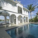 Handout photo of pool house and pool of waterfront mansion previously owned by Al Capone on Palm Island in Miami Beach