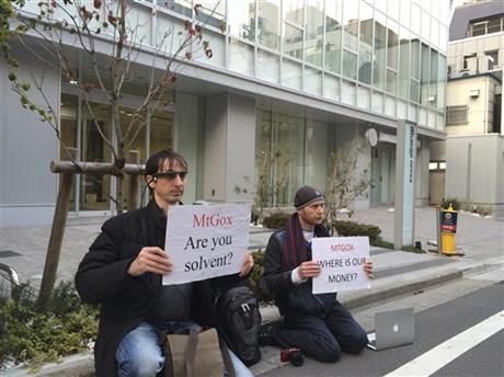Bitcoin trader Kolin Burges, right, of London and American Aaron (only his first name was given)