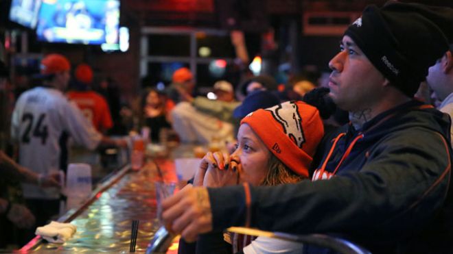 Denver Broncos fans Tatiana Bohorquez and Jorge Puerto