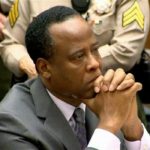 Dr. Conrad Murray listens as Judge Michael Pastor sentences him to four years in county jail for his involuntary manslaughter conviction of pop star Michael Jackson in Los Angeles