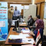 Election officials prepare to distribute voter ID cards to Iraqi citizens in Baghdad