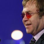 Elton John delivers remarks after receiving a lifetime achievement award for his philanthropic work from the Rockefeller Foundation in Washington
