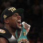 Mayweather Jr. of the U.S. celebrates his victory over Alvarez at the MGM Grand Garden Arena in Las Vegas