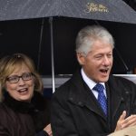Former U.S. President Clinton and his wife Hillary attend the swearing-in ceremony of McAuliffe as Virginia's governor in Richmond