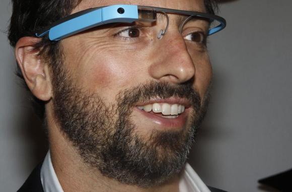 Google founder Sergey Brin poses for a portrait wearing Google Glass glasses before the Diane von Furstenberg Spring/Summer 2013 collection show during New York Fashion Week