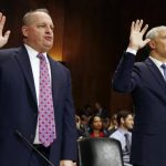CFO of Target Mulligan and CIO at Neiman Marcus Kingston swear in on Capitol Hill in Washington