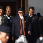 Nepali Congress Party President Sushil Koirala, center