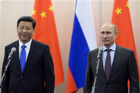 Russian President Vladimir Putin, right, and Chinese President Xi Jinping