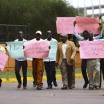 Supporters celebrate after Uganda's President Museveni signed a law imposing harsh penalties for homosexuality in Kampala