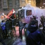 Turkish riot police fire water