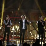 Music group One Direction performs "Story of My Life" at the 41st American Music Awards in Los Angeles
