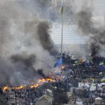 Anti-government protesters set fires in Independence Square in central Kiev