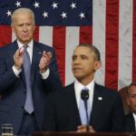 Vice President Biden applauds and Speaker of the House Boehner looks on as President Obama delivers his State of the Union speech on Capitol Hill in Washington