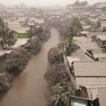 A housing complex is seen covered with ash from Mount Kelud, in Yogyakarta