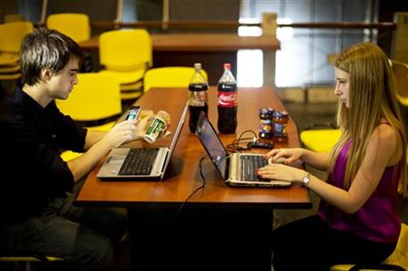 Yamila Fraiman, right, and Alejandro Torrado, computer engineering students