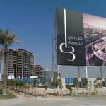 a billboard showing the Dubai Design District