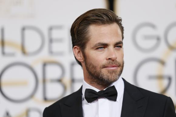 Actor Chris Pine arrives at the 71st annual Golden Globe Awards in Beverly Hills