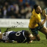 Australia's Israel Folau is tackled by Scotland's Duncan Weir during their rugby union international test match at Murrayfield Stadium in Edinburgh Scotland