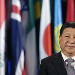 Chinese President Xi Jinping looks on during a visit at the UNESCO headquarters in Paris