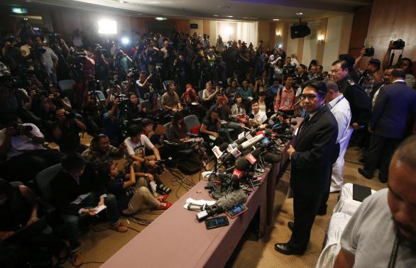 Department of Civil Aviation Director General Datuk Azharuddin Abdul Rahman looks on during a news conference at the Kuala Lumpur International Airport in Sepang