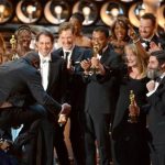Director Steve McQueen, left