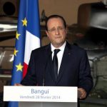 French President Francois Hollande speaks and greets troops at the French military base in Bangui's Mpoko international airport