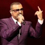 British singer George Michael performs on stage during his "Symphonica" tour concert in Vienna