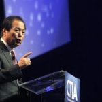 J.K. Shin, president of Mobile Communications Business for Samsung Electronics, gives a keynote address during the International CTIA Wireless trade show in Las Vegas