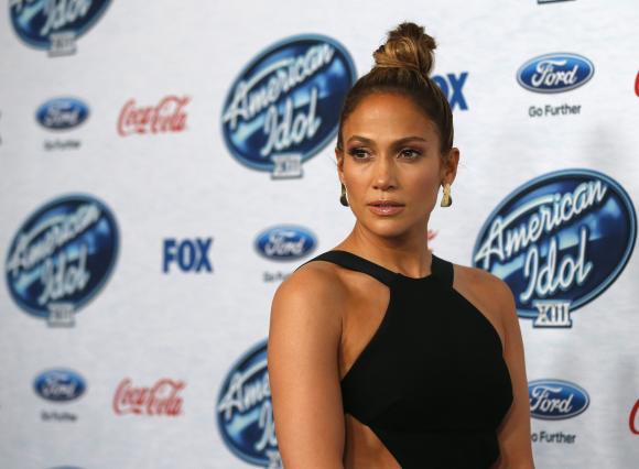 Singer and judge Lopez poses at the party for the finalists of "American Idol XIII" in West Hollywood