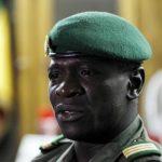 Mali's junta leader Captain Sanogo speaks to media after agreeing to hand over power to president of National Assembly, at military base in Kati