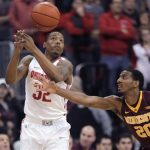 Minnesota's Austin Hollins, right, tips the ball away from Ohio State's Lenzelle Smith