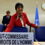 UN High Commissioner for Human Rights Pillay arrives for her address to the 25th session of the Human Rights Council at the United Nations in Geneva