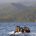 Members of Philippine marines are transported on rubber boat from patrol ship after conducting mission on disputed Second Thomas Shoal as they make way to naval forces camp in Palawan