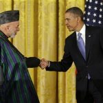 President Barack Obama shakes hands with Afghan President Hamid Karzai