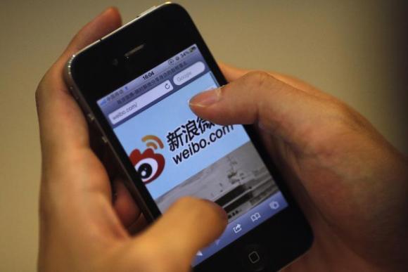 A man visits Sina's Weibo microblogging site in Shanghai