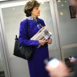 U.S. Senator Dianne Feinstein (D-CA) waits for a subway car with aides as she returns to her office after a floor speech aimed at the CIA's handling of documents related to the Senate Intelligence Committee, at the U.S. Capitol in Washington March 11, 2014. The U.S. Senate Intelligence Committee did not hack into CIA computers to obtain an internal report on interrogations and detentions, the committee chairwoman said on Tuesday. REUTERS/Jonathan Ernst (UNITED STATES - Tags: POLITICS)