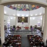 Catholics attend a Mass to celebrate Good Friday in Abuja, Nigeria