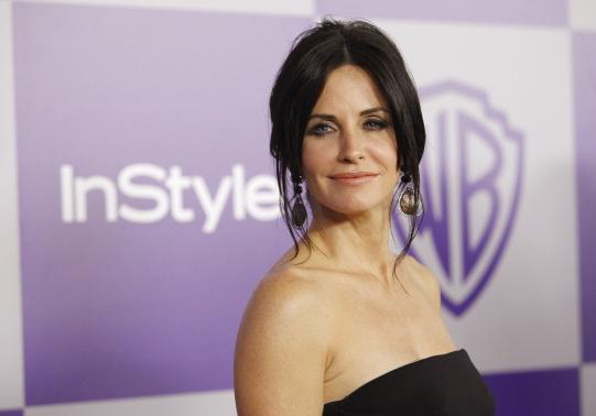 File photo of Cox posing at the Warner Bros./InStyle after party after the 67th annual Golden Globe Awards in Beverly Hills