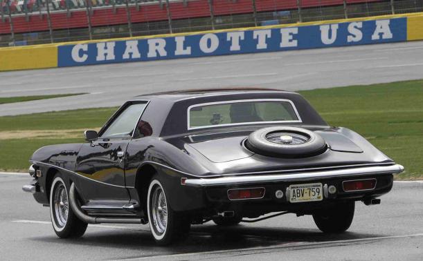 U.S. stock car racing driver Earnhardt Jr. pulls out onto the track in Presley's 1973 Stutz Blackhawk III during a media event at Charlotte Motor Speedway